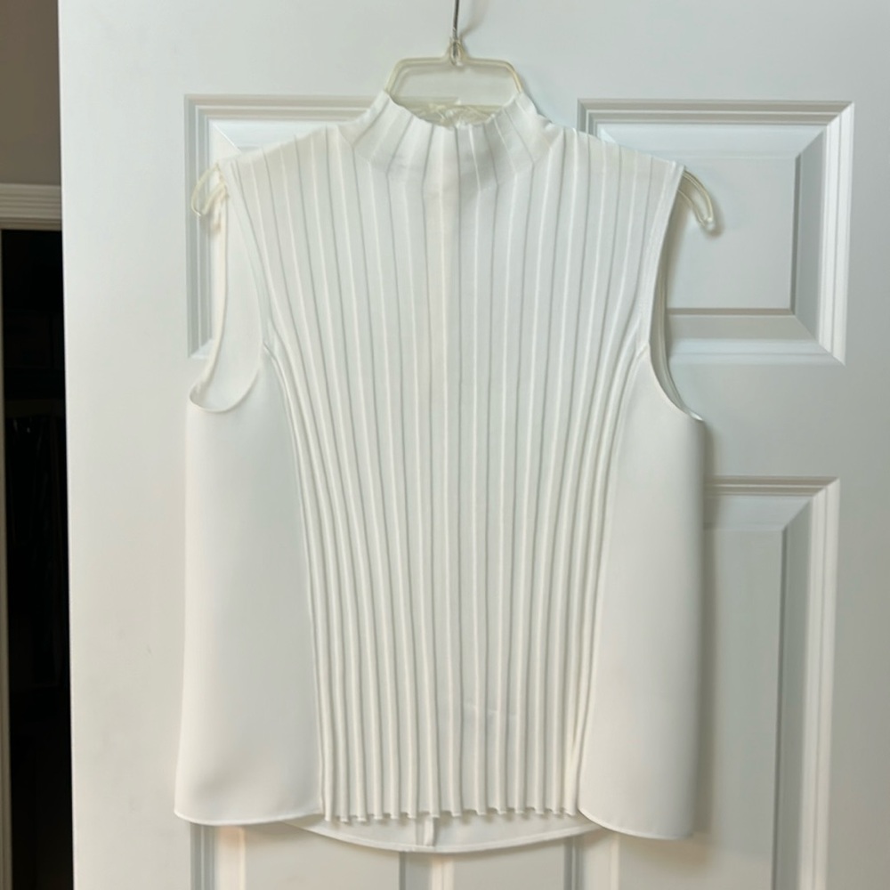 Vince off white sleeveless mock neck top. Size M
